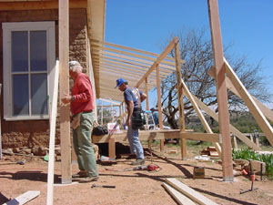 Photo - Steve Harper and Mark South framing the porch.